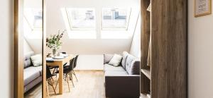 Deluxe Two-Bedroom Apartment with Balcony and air conditioning in the Attic room in Apartamenty Forma Tatrica