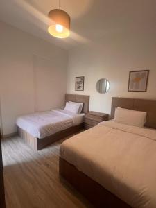 Privado by Manazil, 22, Elegant 2BR, Hotel-Style Living