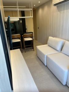 APARTAMENTO SOFISTICADO, VISTA MAR e ACESSO EXCLUSIVO à PRAIA