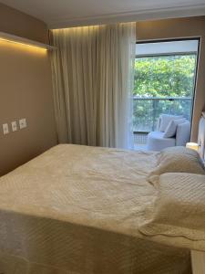 APARTAMENTO SOFISTICADO, VISTA MAR e ACESSO EXCLUSIVO à PRAIA