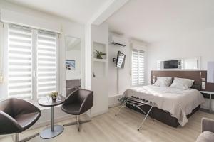 Appartements Le refuge, tout confort avec climatisation : photos des chambres