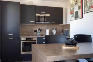 Appartements Atelier Edonya - Au coeur de la Teste : photos des chambres