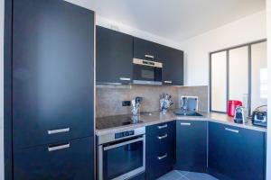 Appartements Atelier Edonya - Au coeur de la Teste : photos des chambres