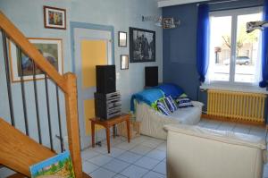 Appartements Volets Bleus et Briques Rouges : photos des chambres