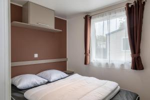 Campings Mobil-home 2 chambres - B : photos des chambres