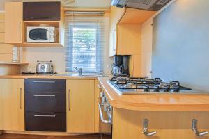 Campings Mobilhome tout equipe bois masson : photos des chambres