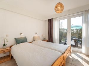 Apartment Sirius with parking and shared pool by Interhome