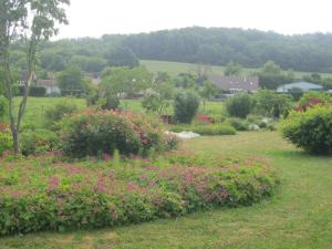 Sejours a la ferme Au Jardin Fleuri : photos des chambres