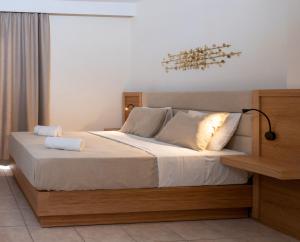 Triple Room with Garden and Pool View room in Calypso Hotel
