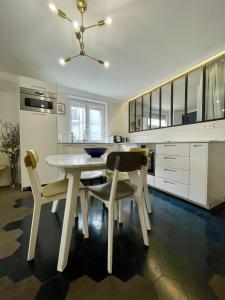 Appartements PARISIAN HOME l MONTORGUEIL : photos des chambres