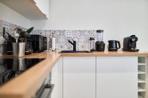 Appartements Le Raffine Centre Ville : photos des chambres