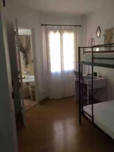 Appartements appartement coquet dans maison de village : photos des chambres