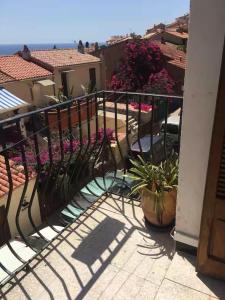 Appartements appartement coquet dans maison de village : photos des chambres