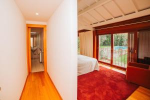 Quarto Duplo com Jardim e Piscina