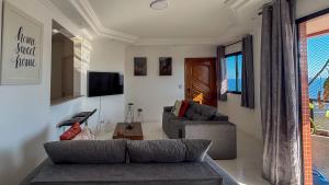 Apto vista mar, pé na areia #013