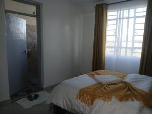 Modern 2 Bedroom with Master Ensuite & Mount Kenya Views - Nanyuki CBD at MGs Mountain Nest