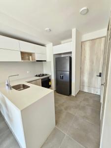 Coralina Suites - Apto moderno con wifi, a 10 min del aeropuerto