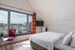 Ostsee - Reetdachhaus Nr 8 "Sonne und mehr" - mit Lademöglichkeit im Strand Resort