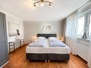 M5 Bungalow - Apartmenthaus Marienburger Str 4 - FERIENDOMIZIL HOLLICH