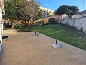 Maison confortable centre-ville avec jardin, proche commerces - FR-1-323-563