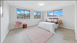 Center of Rouse Hill house with back yd