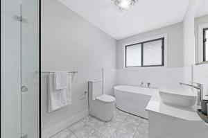 Center of Rouse Hill house with back yd