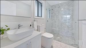 Center of Rouse Hill house with back yd
