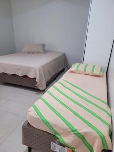 Loft 80 metros do mar na Praia Central com garagem