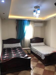 شقه بالكامل مفروش 3غرفه للايجار بحدائق الاهرام بجوار المتحف والاهرامات