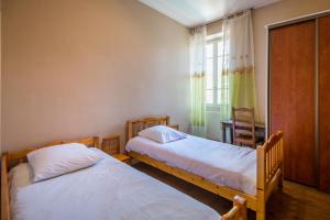 Appartements Maison Eugene centre-ville piscine jardin fibre garage : photos des chambres