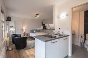 Appartements Orfevres Cathedrale : photos des chambres