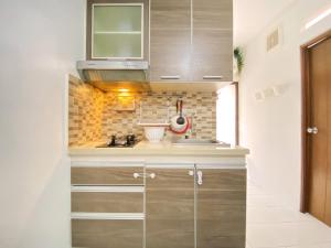 Fancy Designed 2BR at Gateway Ahmad Yani Cicadas Apartment By Travelio