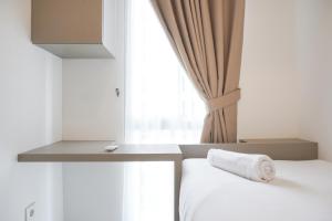 Comfort 2BR at 20th Floor Tokyo Riverside PIK 2 Apartment By Travelio