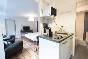 Appartements Orfevres Cathedrale : photos des chambres