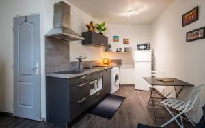 Appartements Studio SO rez de chaussee centre-ville : photos des chambres