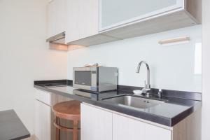 Nice and Elegant 2BR at 26th Floor Menteng Park Apartment By Travelio