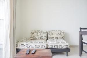 Nice and Elegant 2BR at 26th Floor Menteng Park Apartment By Travelio