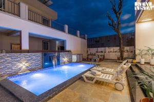 Nakeshatra Villa by VEO - Part of StayVista with Pool, Lawn, Balcony at city center in Udaipur