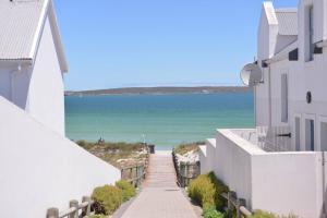 Pelican Cove is a Modern 4-Bedroom Holiday Home in Langebaan with some Sea Views