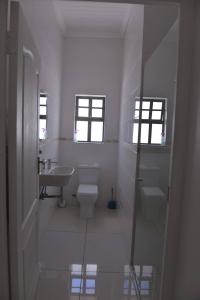 Pelican Cove is a Modern 4-Bedroom Holiday Home in Langebaan with some Sea Views