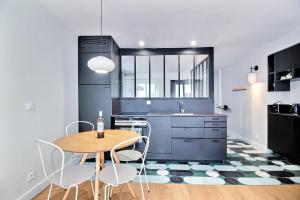 Appartements PARISIAN HOME l MONTORGUEIL : photos des chambres