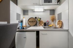 Appartements Le Flamboyant du Fonserane - Climatise : photos des chambres