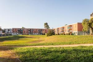 Appartements Le Flamboyant du Fonserane - Climatise : photos des chambres