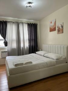 Vins Cloud9 Queen Bed Netflix SMX-Davao Airport-Samal Ferry