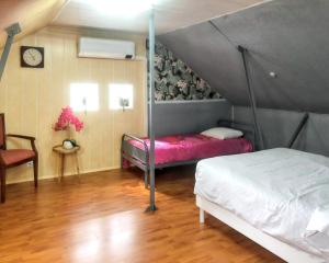 Villas Villa charmante a Saint-Martin-Longueau avec piscine privee : photos des chambres