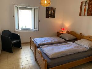 Appartements maison le croixsud : photos des chambres