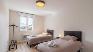 Appartements Le Dauphine 10 Allevard : photos des chambres