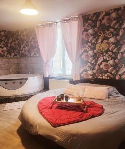 Appartements L'atelier des reves, balneo, lit rond, centre-ville : photos des chambres