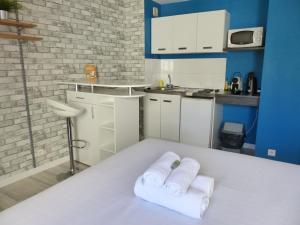 Appartements 3 Rois - Joli studio 2 pers, place de parking : photos des chambres