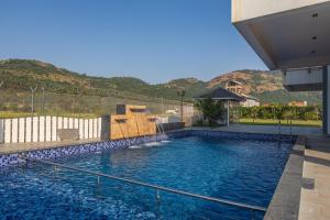 ELIVAAS Nimishka 5 BHK Villa with Pvt Pool, Garden & Scenic Views